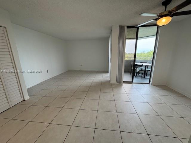8335 Southwest 152nd Avenue, Unit PH2 Miami, FL 33193 - Photo 10 of 19 a view of an empty room with a window