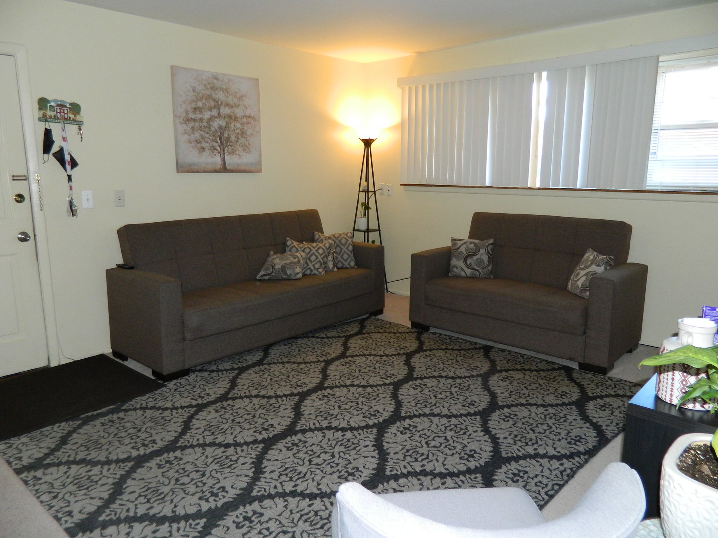 6625 Pershing Road Stickney, IL 60402 - Photo 6 of 10 a living room with furniture and a couch
