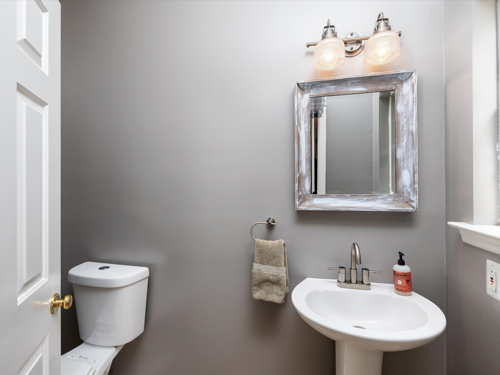 6480 Peytonsville-Arno Road College Grove, TN 37046 - Photo 45 of 96 a bathroom with a toilet sink and mirror