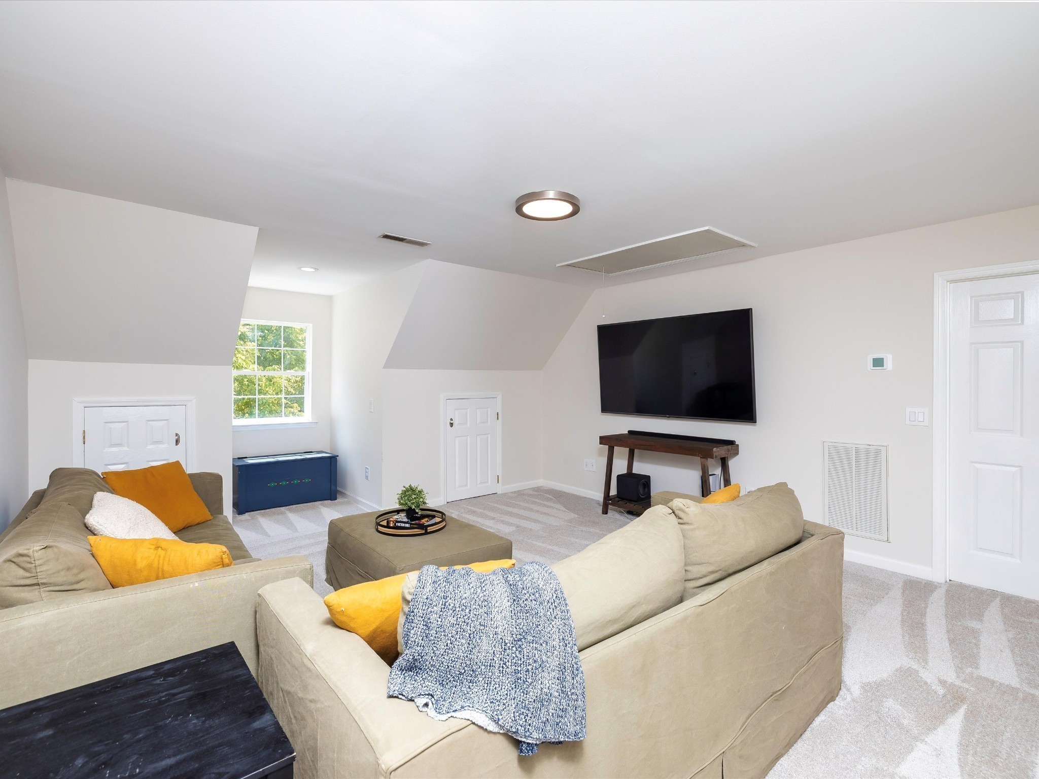 6480 Peytonsville-Arno Road College Grove, TN 37046 - Photo 49 of 96 a living room with furniture and a flat screen tv