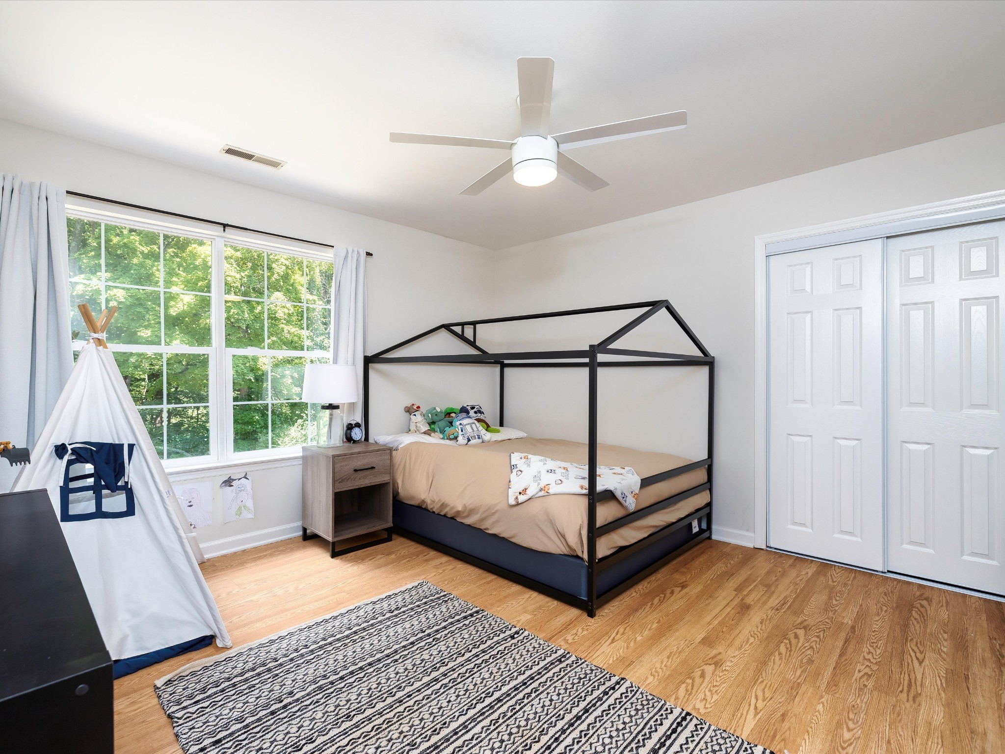 6480 Peytonsville-Arno Road College Grove, TN 37046 - Photo 52 of 96 a bedroom with a bed and large window
