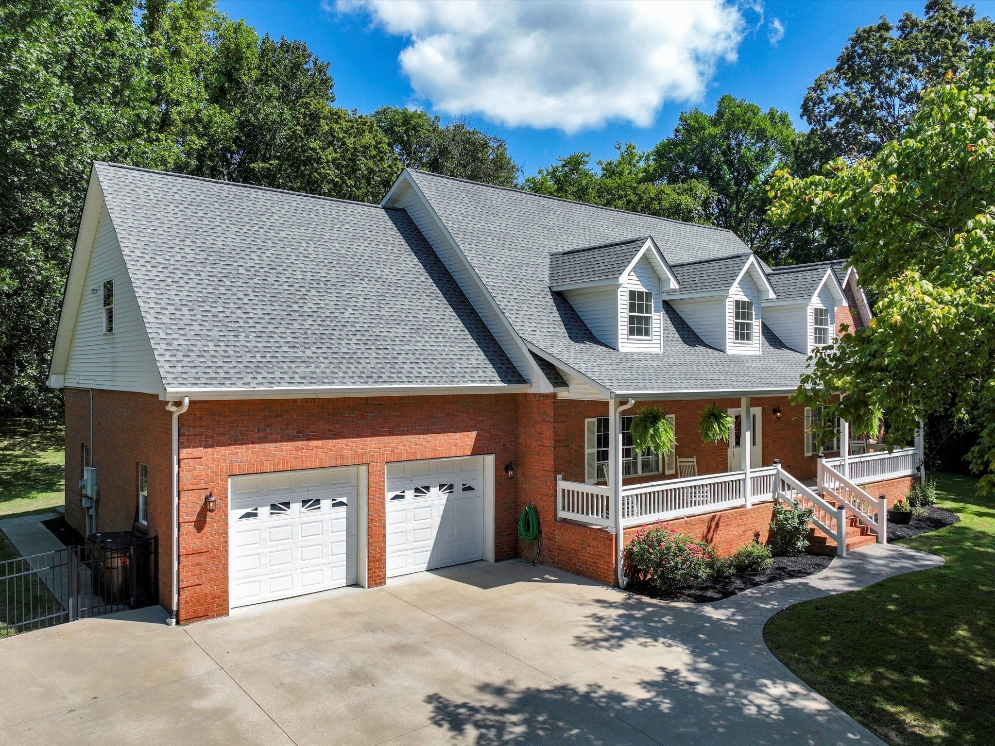 6480 Peytonsville-Arno Road College Grove, TN 37046 - Photo 8 of 96 a front view of a house with a garage