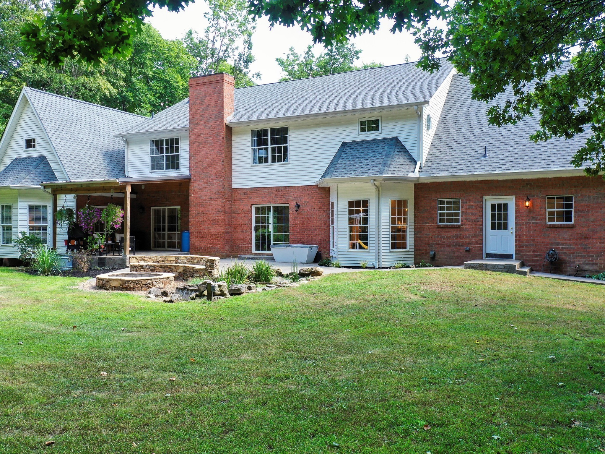 6480 Peytonsville-Arno Road College Grove, TN 37046 - Photo 88 of 96 front view of a brick house with a yard