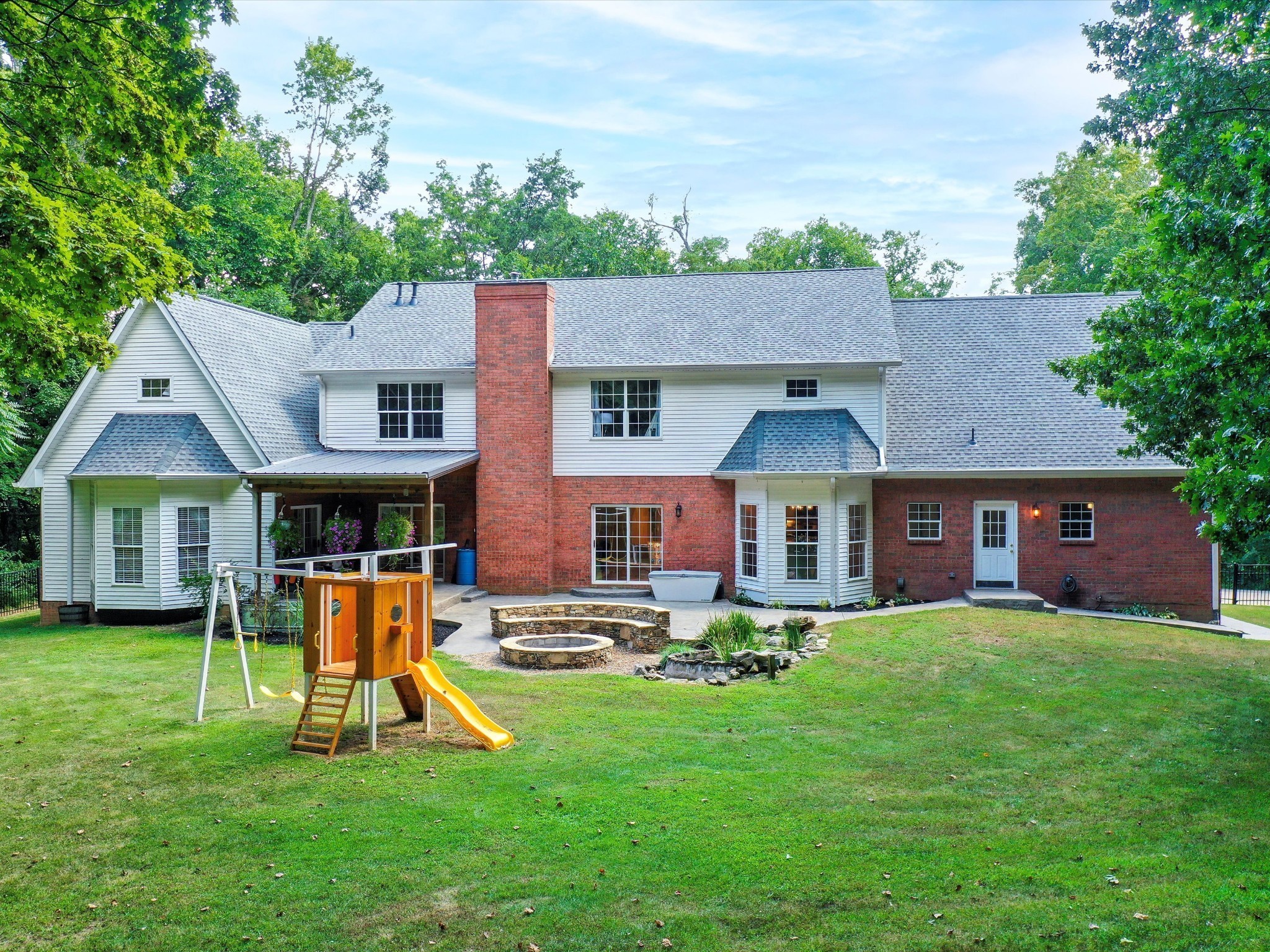 6480 Peytonsville-Arno Road College Grove, TN 37046 - Photo 89 of 96 a view of a house with a yard and a large tree