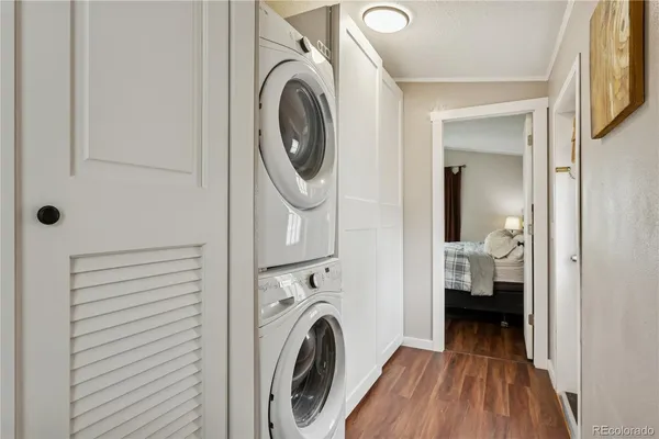 a view of a hallway with washer and dryer