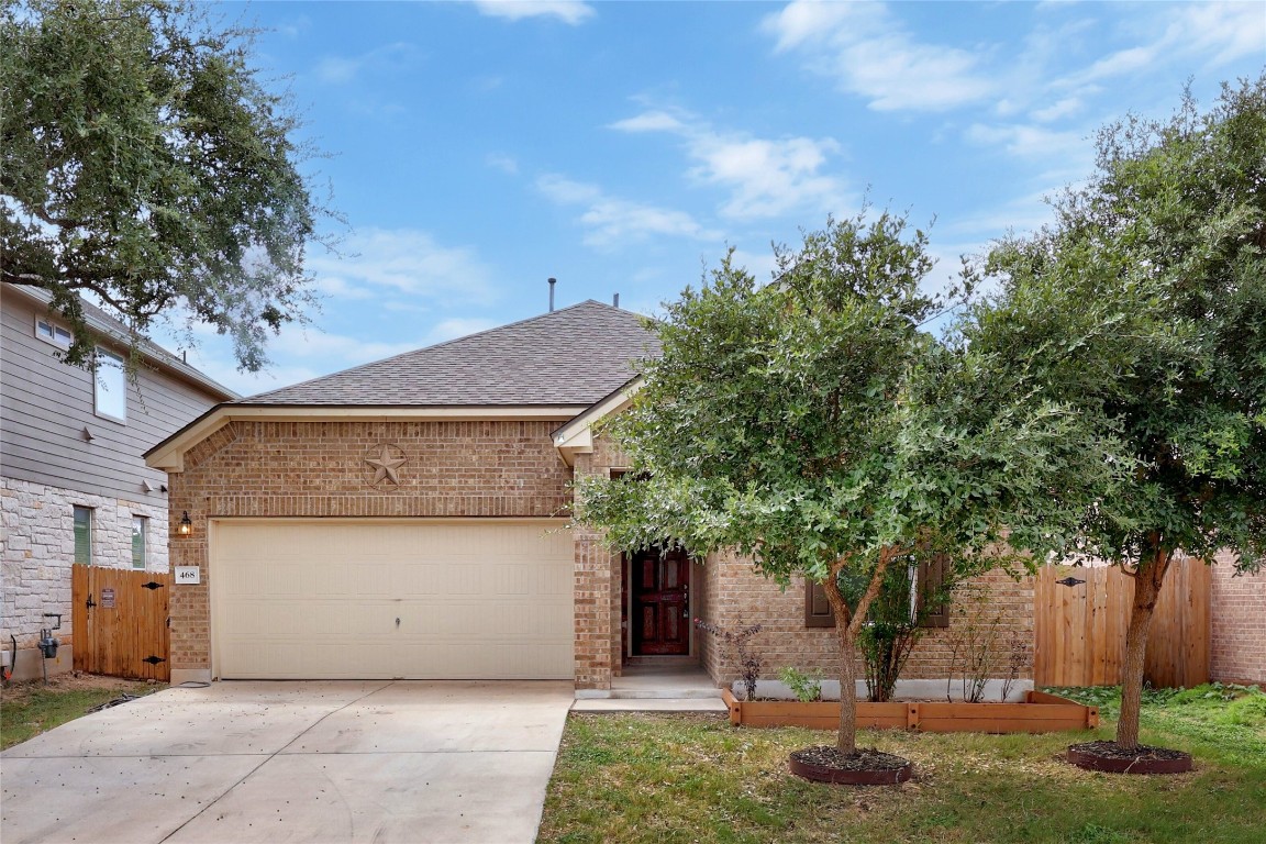 468 Sheepshank Drive Georgetown, TX 78633 - Photo 2 of 27 a front view of a house with a yard