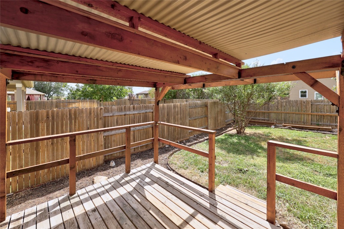 468 Sheepshank Drive Georgetown, TX 78633 - Photo 25 of 27 a view of a room with wooden floor and iron stairs