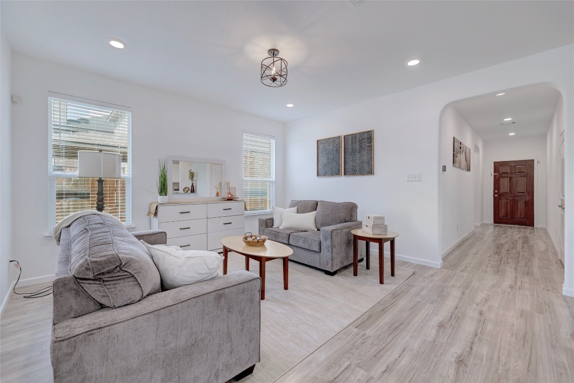 468 Sheepshank Drive Georgetown, TX 78633 - Photo 6 of 27 a living room with furniture and a wooden floor