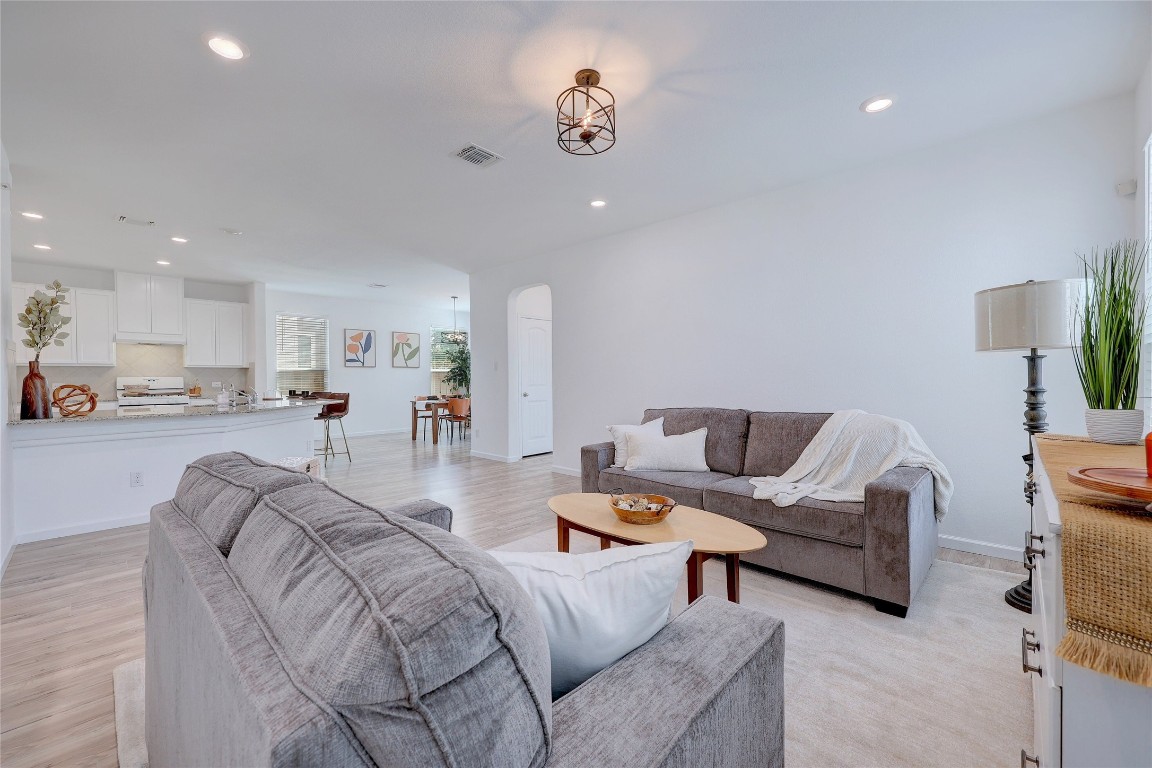 468 Sheepshank Drive Georgetown, TX 78633 - Photo 7 of 27 a living room with furniture and a table