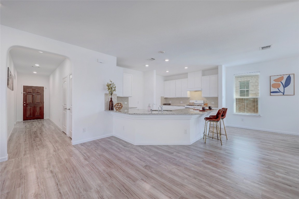 468 Sheepshank Drive Georgetown, TX 78633 - Photo 8 of 27 a view of kitchen with wooden floor