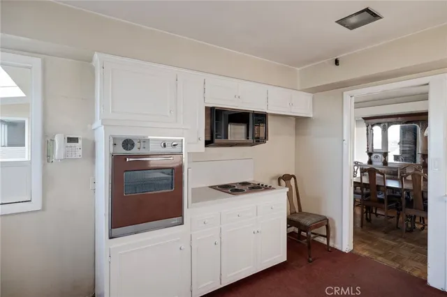 a view of a livingroom with a staircase