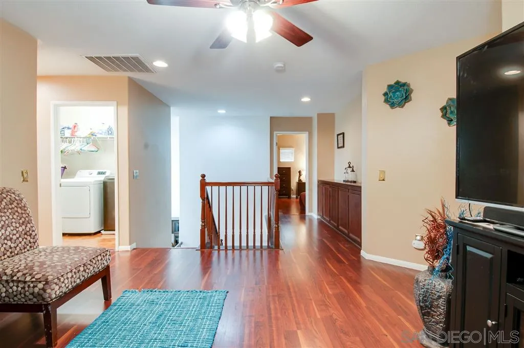 38305 Encanto Road Murrieta, CA 92563 - Photo 11 of 24 a living room with furniture fireplace and flat screen tv
