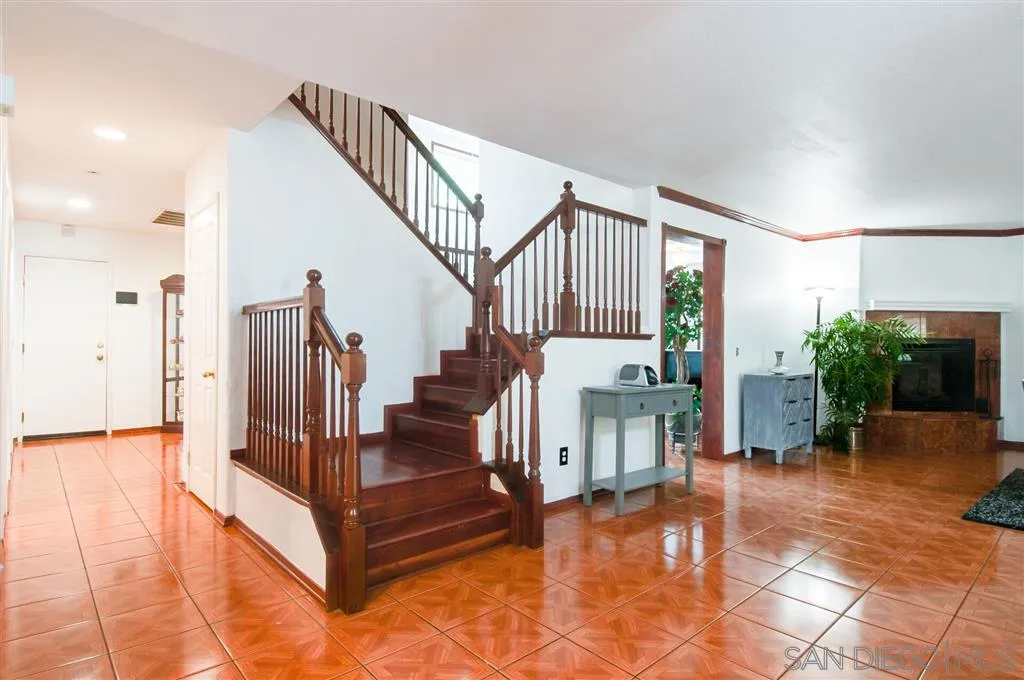 38305 Encanto Road Murrieta, CA 92563 - Photo 16 of 24 a view of entryway livingroom and hall with wooden floor