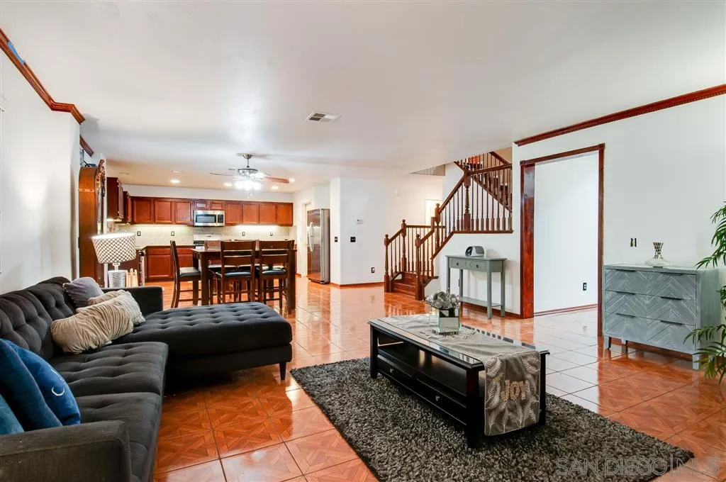 38305 Encanto Road Murrieta, CA 92563 - Photo 21 of 24 a living room with furniture and wooden floor