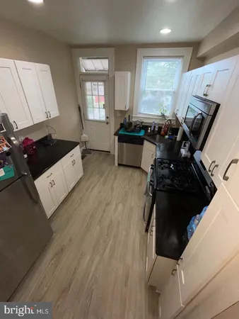 a bed room with a bed furniture and a window
