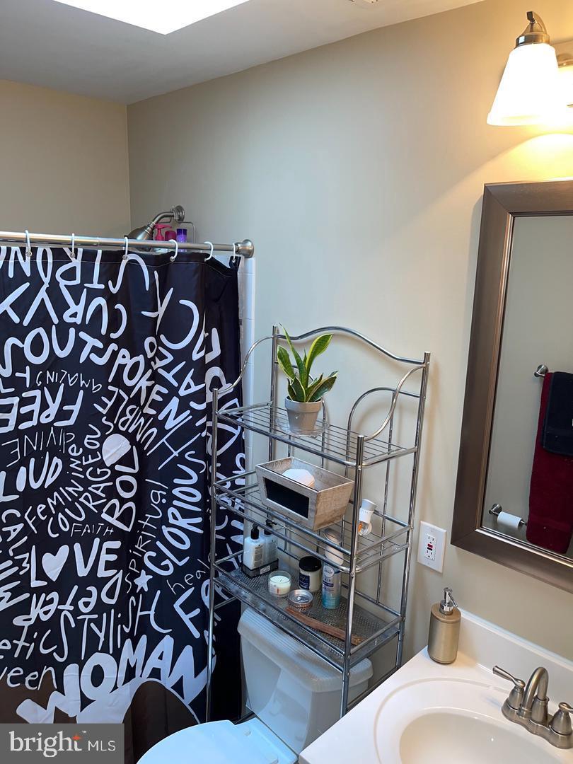 2806 Lake Avenue Baltimore, MD 21213 - Photo 8 of 10 Charming bathroom with modern accents.
