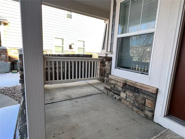 a view of a porch with a door