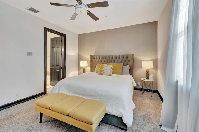 a bedroom with a bed and closet