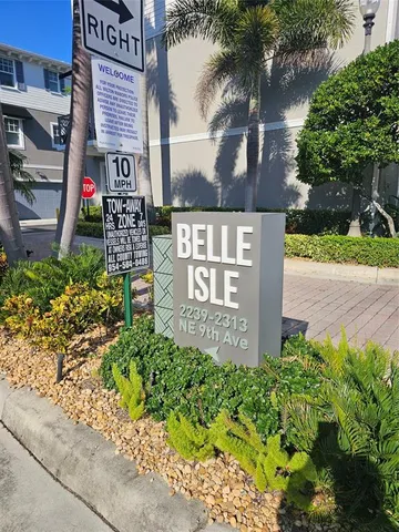 a sign on the side of a road