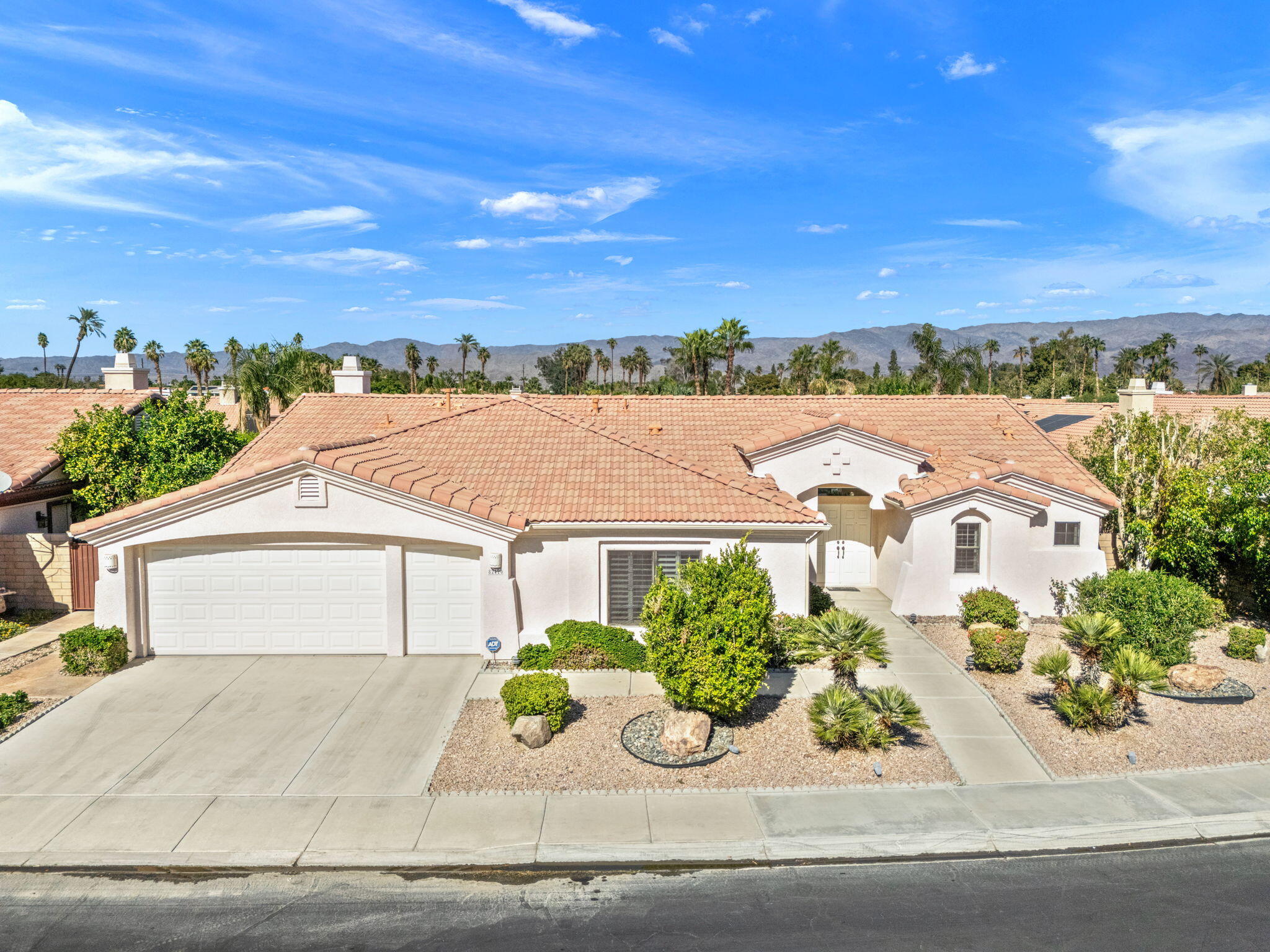 82420 Astaire Avenue Indio, CA 92201 - Photo 1 of 61 front view of a house with a yard