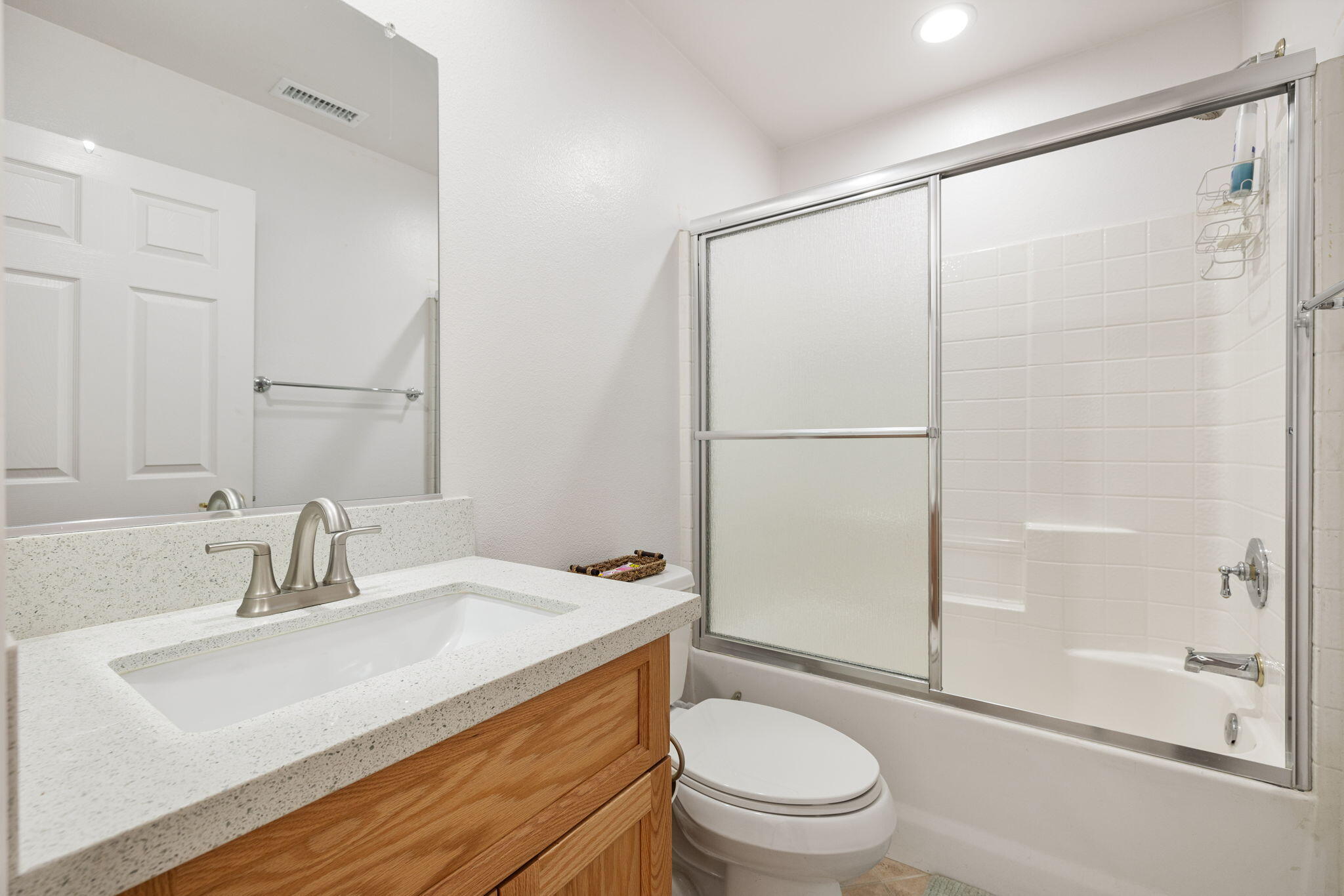 82420 Astaire Avenue Indio, CA 92201 - Photo 28 of 61 a bathroom with a sink toilet and shower