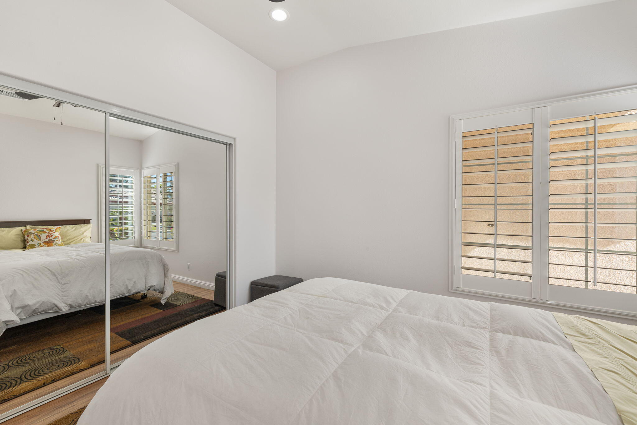 82420 Astaire Avenue Indio, CA 92201 - Photo 30 of 61 a bedroom with two beds and a window