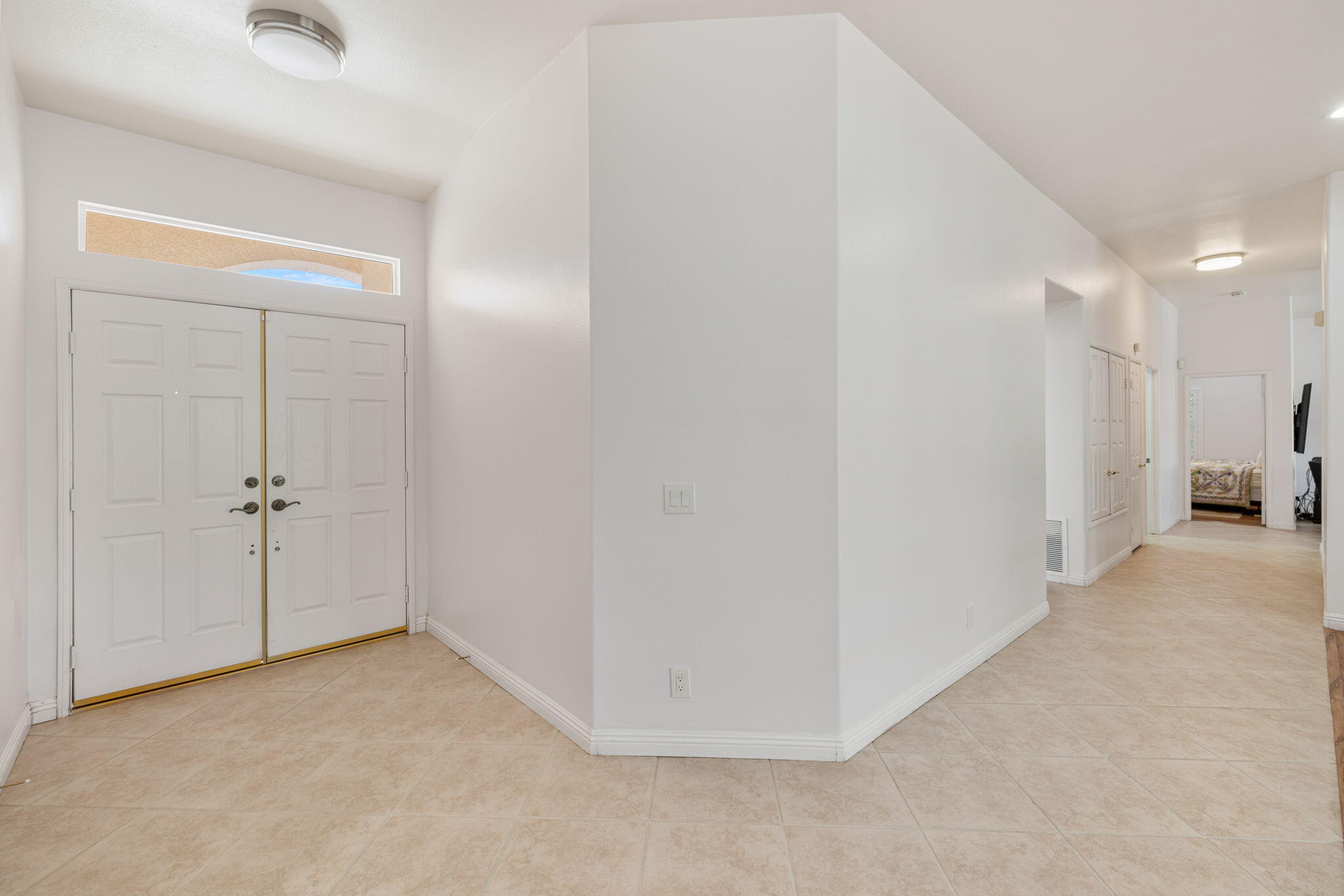 82420 Astaire Avenue Indio, CA 92201 - Photo 4 of 61 a view of a room with a hallway