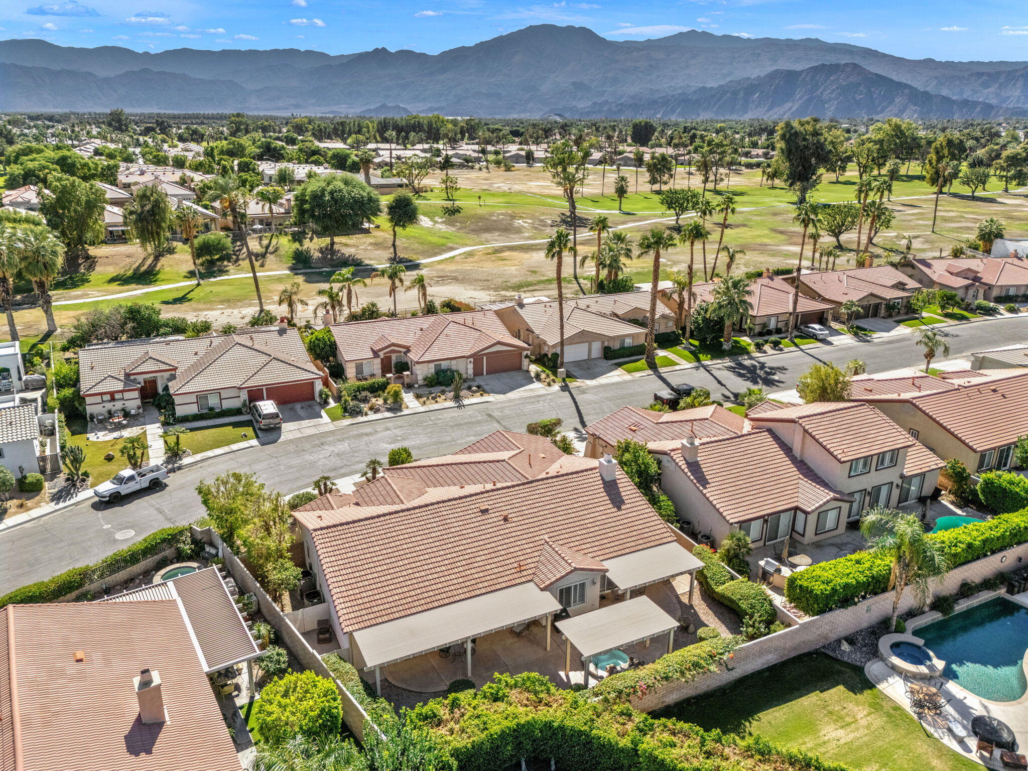 82420 Astaire Avenue Indio, CA 92201 - Photo 48 of 61 an aerial view of residential houses with outdoor space