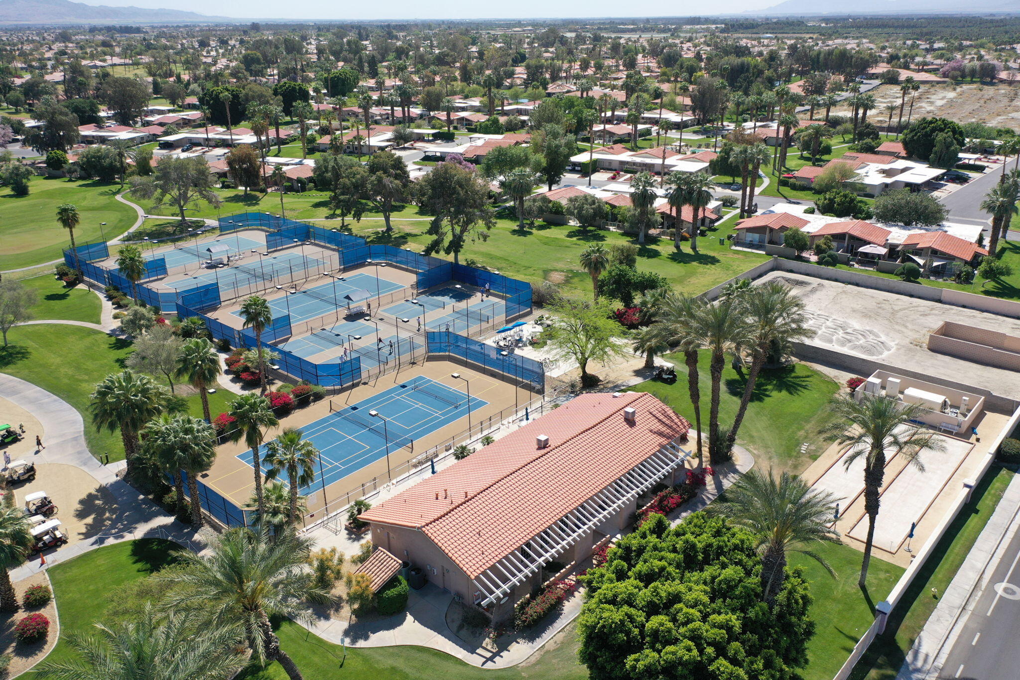 82420 Astaire Avenue Indio, CA 92201 - Photo 54 of 61 an aerial view of a city with lots of residential buildings