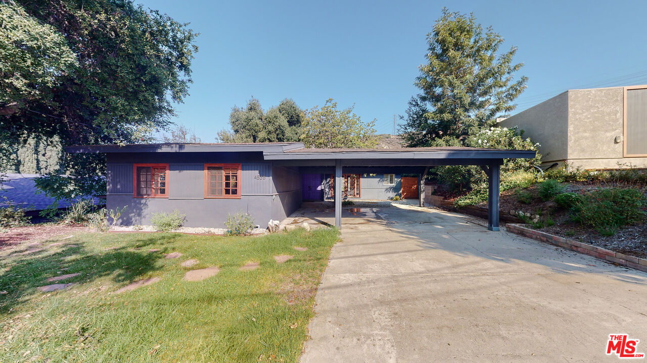 4535 El Prieto Road Altadena, CA 91001 - Photo 2 of 41 a view of a house with a yard patio and a fire pit