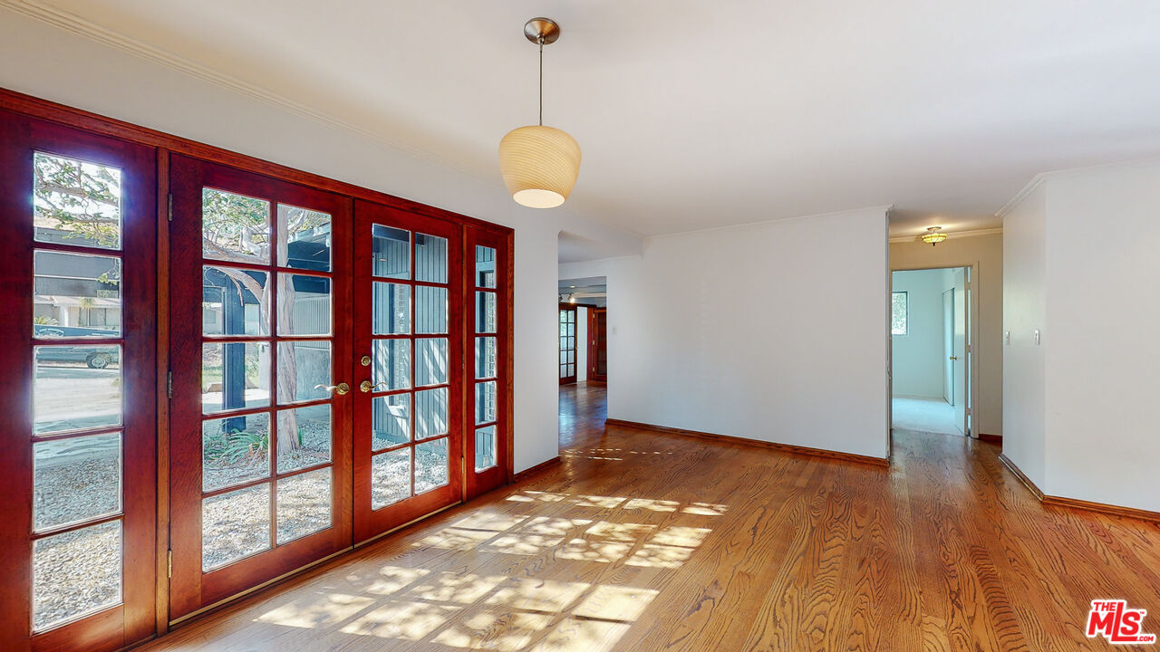 4535 El Prieto Road Altadena, CA 91001 - Photo 16 of 41 a view of an empty room with window and wooden floor