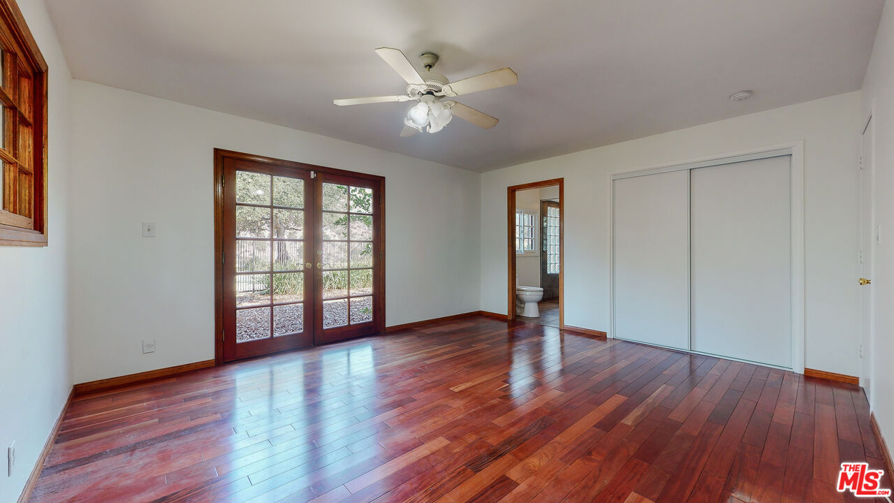 4535 El Prieto Road Altadena, CA 91001 - Photo 25 of 41 a view of an empty room with wooden floor and a window