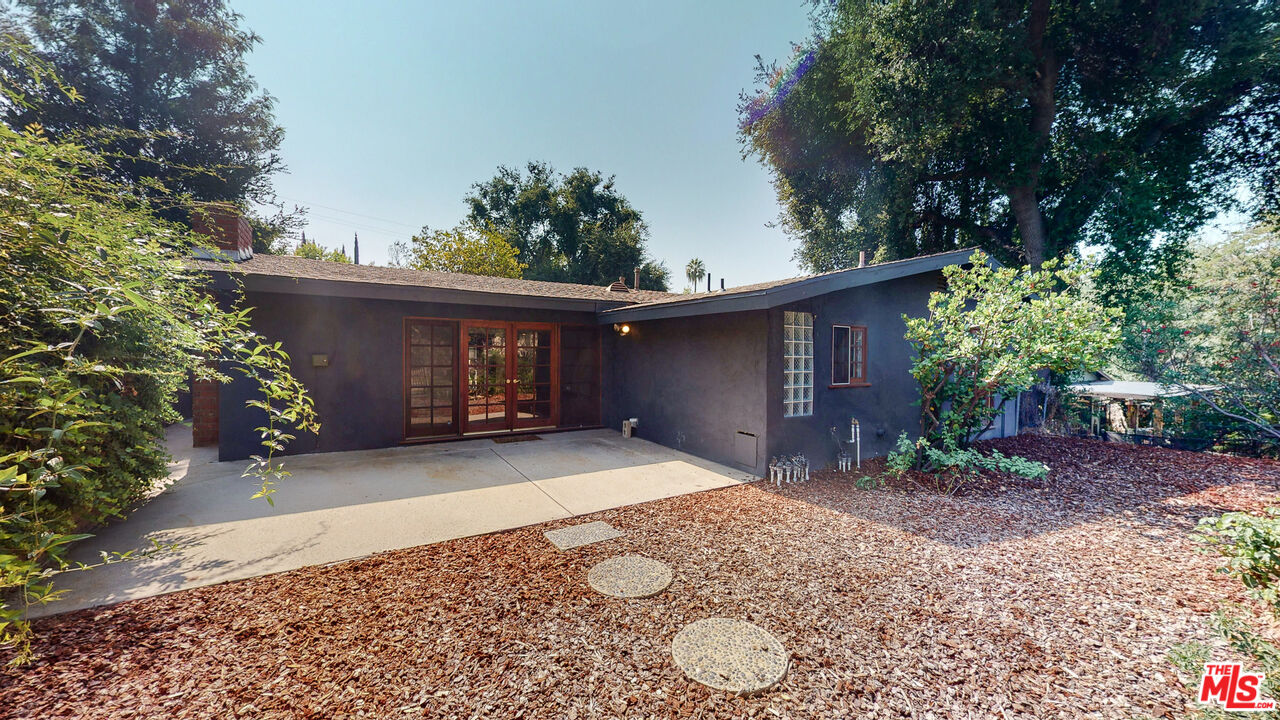4535 El Prieto Road Altadena, CA 91001 - Photo 33 of 41 a view of a house with a yard and garage
