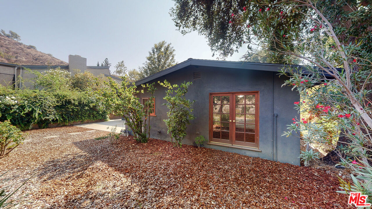 4535 El Prieto Road Altadena, CA 91001 - Photo 34 of 41 a view of a house with a yard
