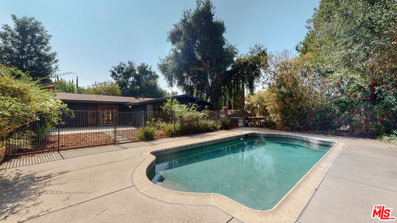 4535 El Prieto Road Altadena, CA 91001 - Photo 37 of 41 a view of a swimming pool in back of house