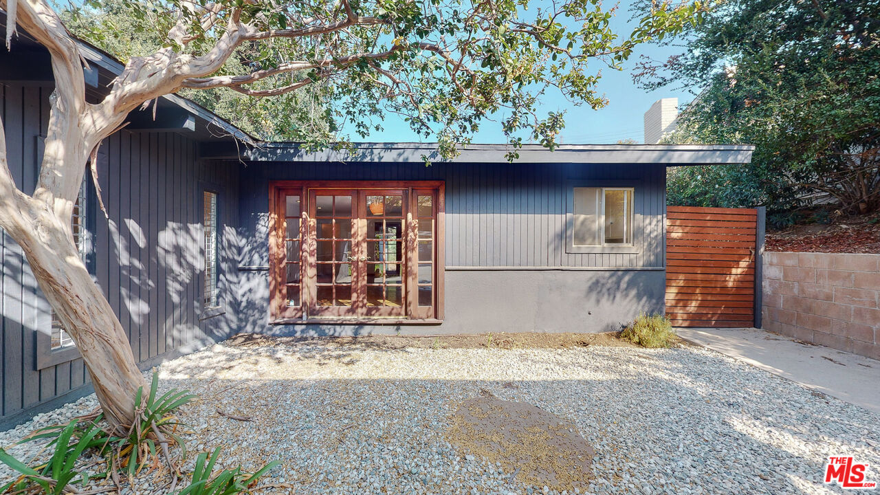 4535 El Prieto Road Altadena, CA 91001 - Photo 5 of 41 a front view of a house with a yard