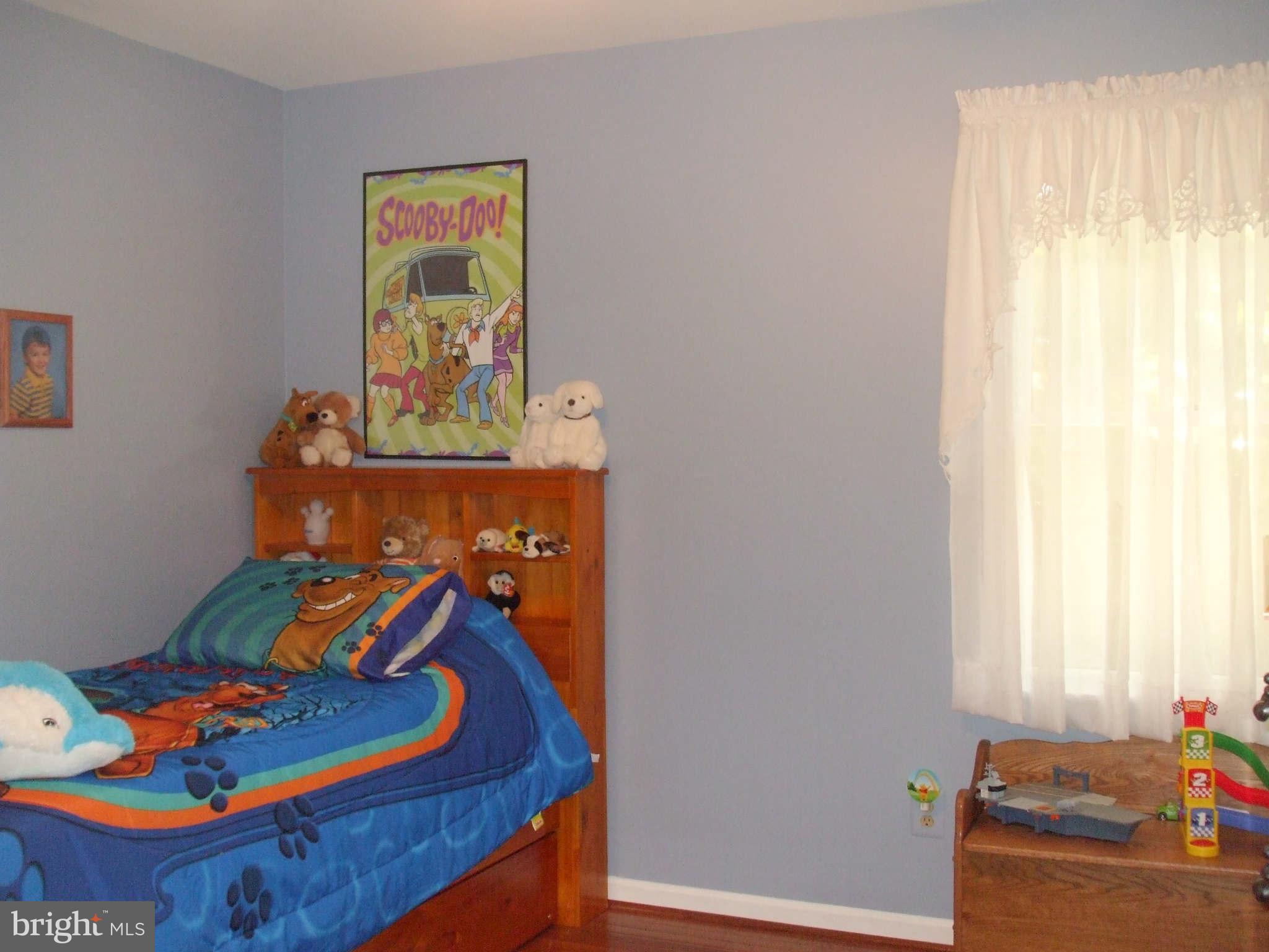 595 Ridgewood Road Bel Air, MD 21014 - Photo 20 of 26 a bed room with furniture and a window