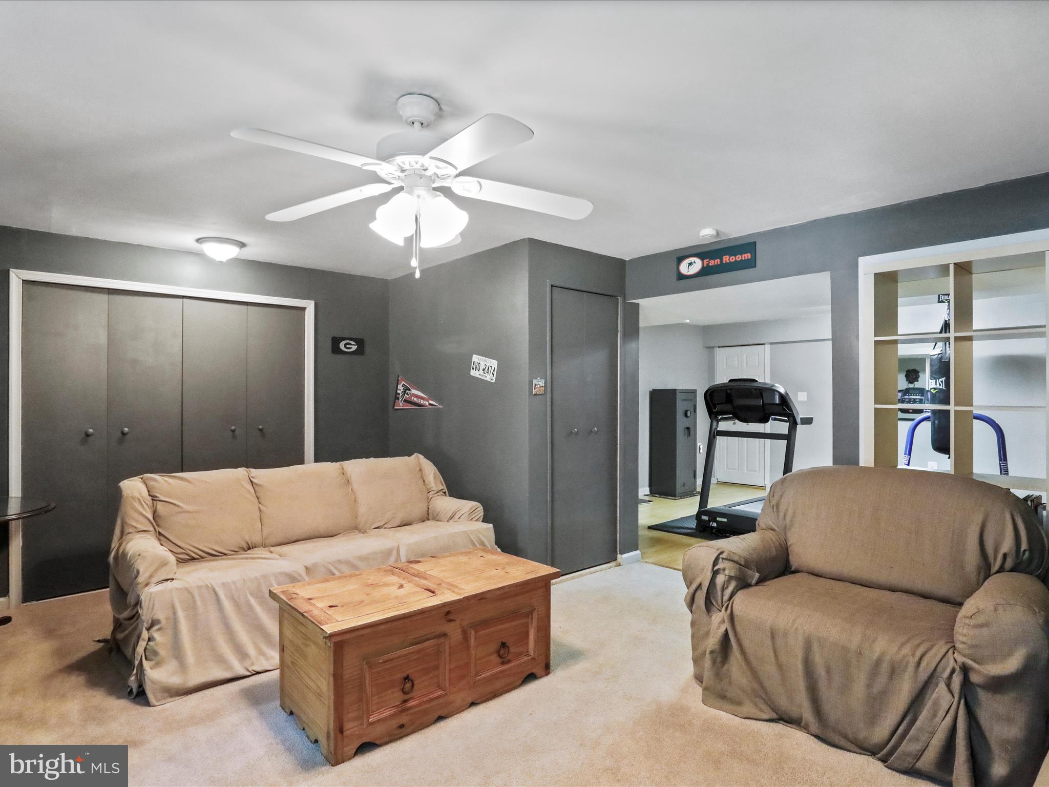 31 Trix Court Ranson, WV 25438 - Photo 28 of 40 a living room with furniture and a chandelier