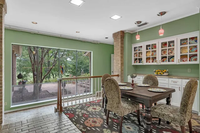 a workspace with furniture and a window