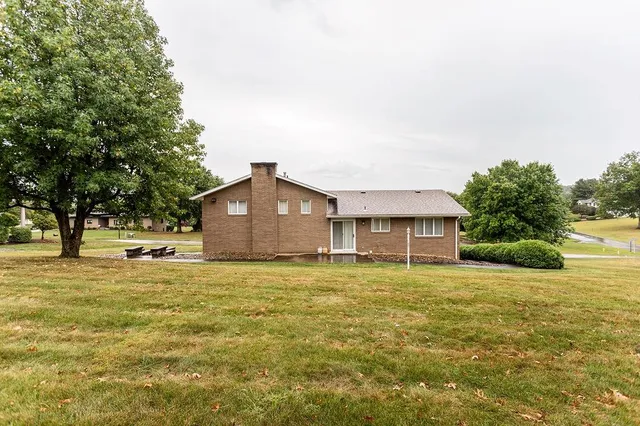 a house with yard in front of it