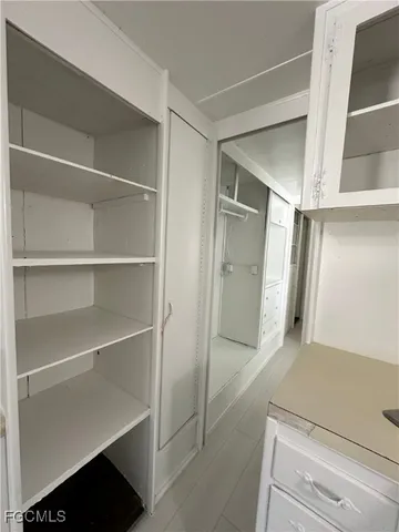 a hallway with closet