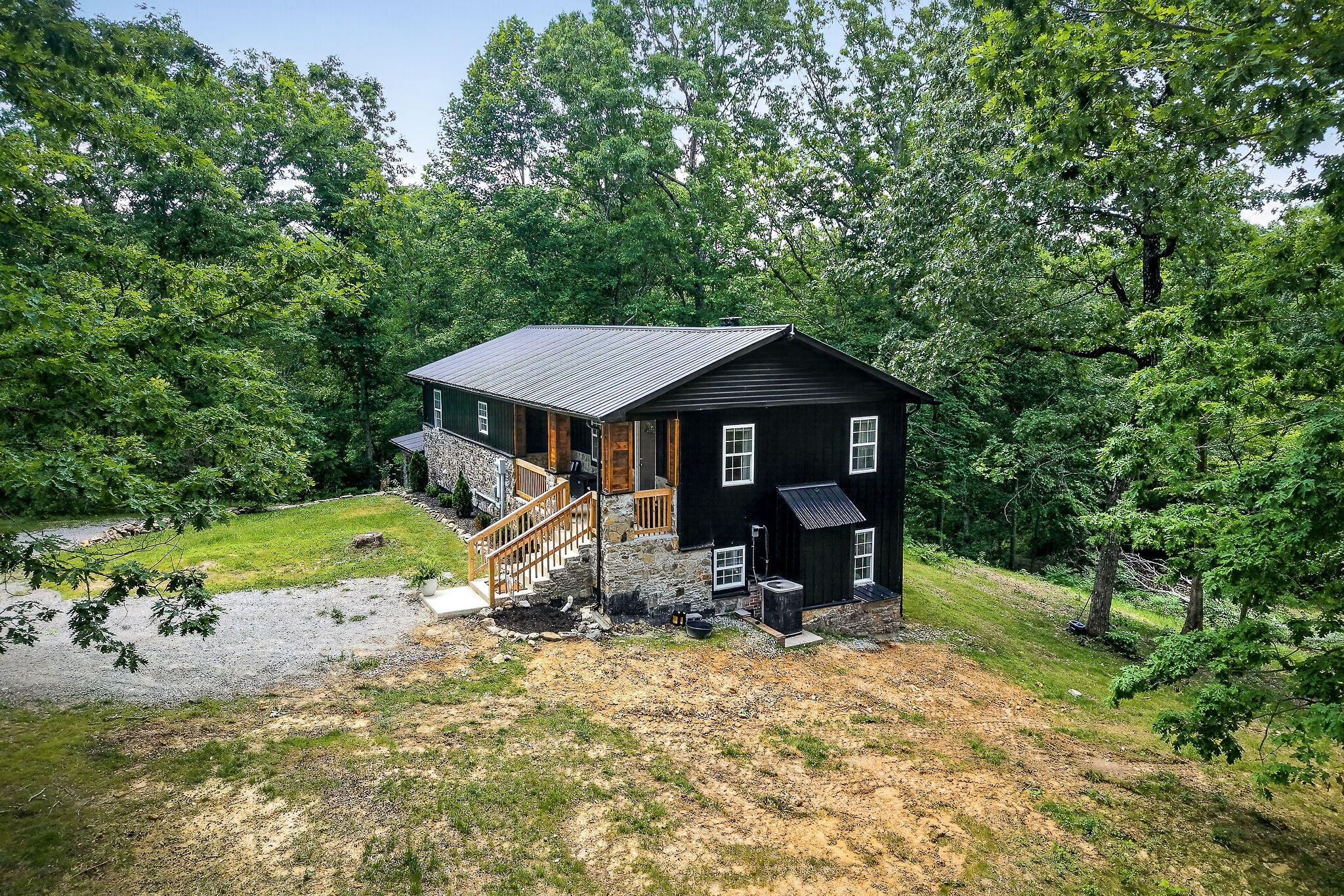 9388 Harrison Ferry Road McMinnville, TN 37110 - Photo 2 of 41 front view of a house with a yard