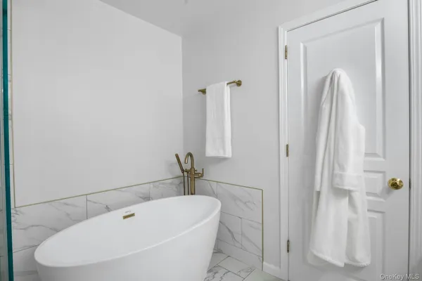 a bathroom with a sink and shower