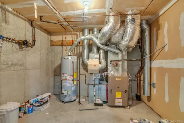 a living room with a table and a window