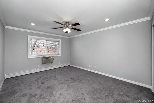 58 Horseblock Road, Unit 582A Centereach, NY 11720 - Photo 6 of 8 an empty room with windows and ceiling fan