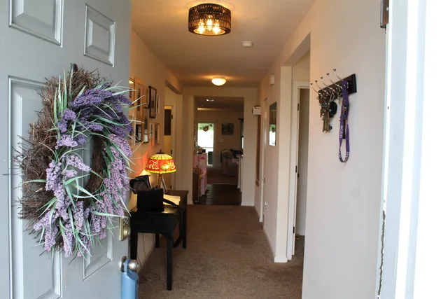 a view of a hallway with entryway