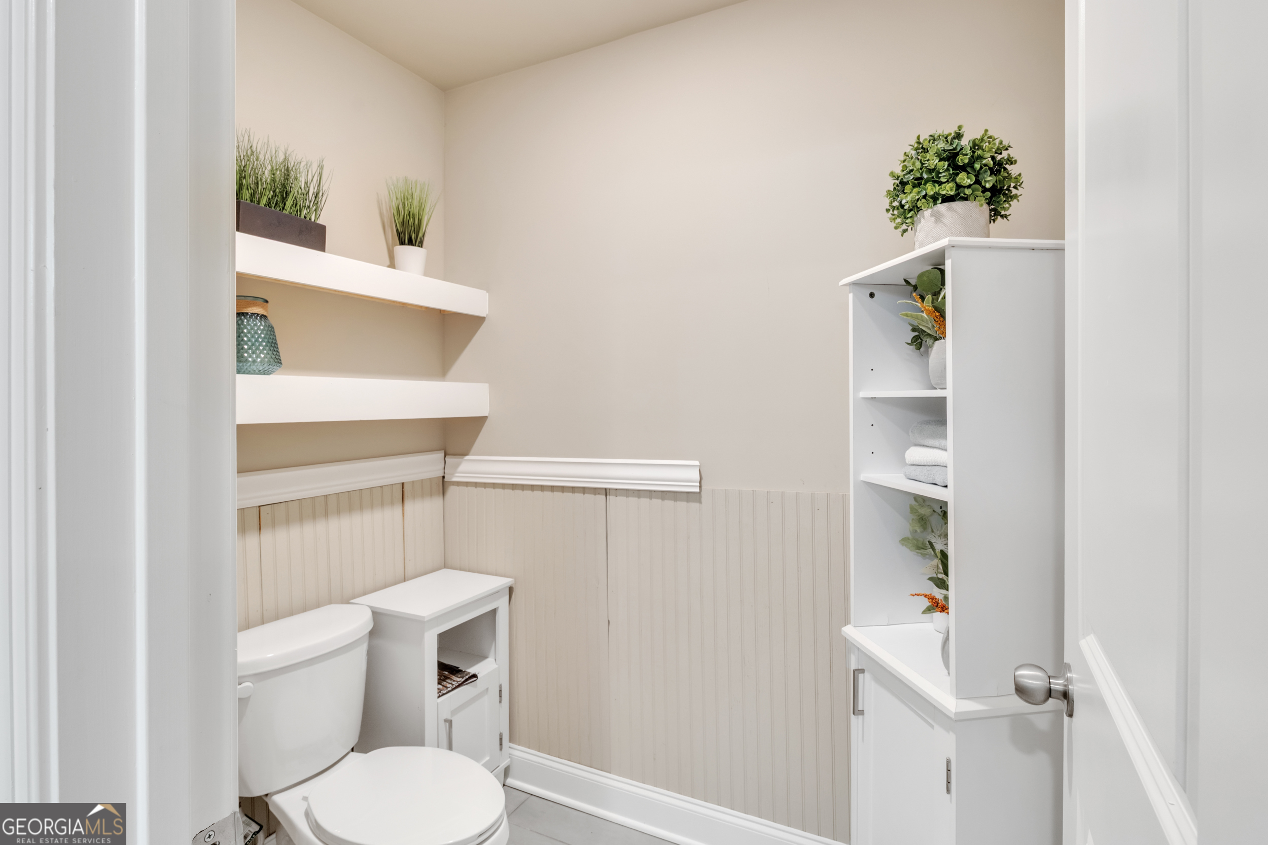11614 Alcovy Road Covington, GA 30014 - Photo 39 of 62 a bathroom with a toilet