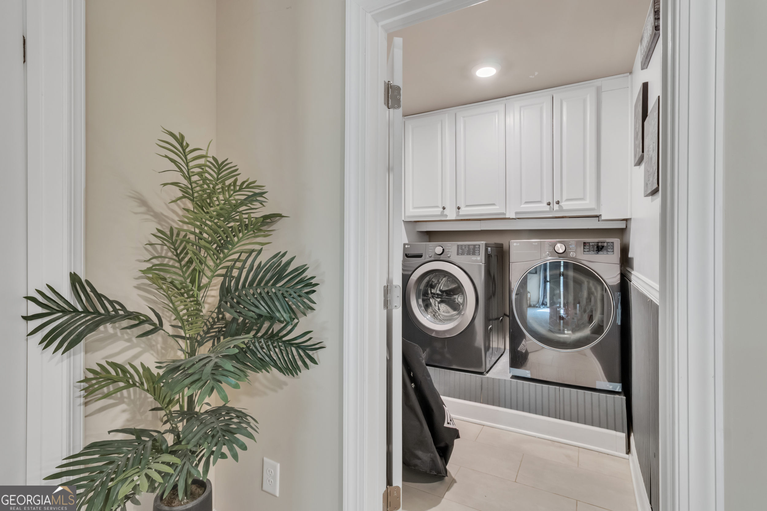 11614 Alcovy Road Covington, GA 30014 - Photo 41 of 62 a utility room with dryer and washer