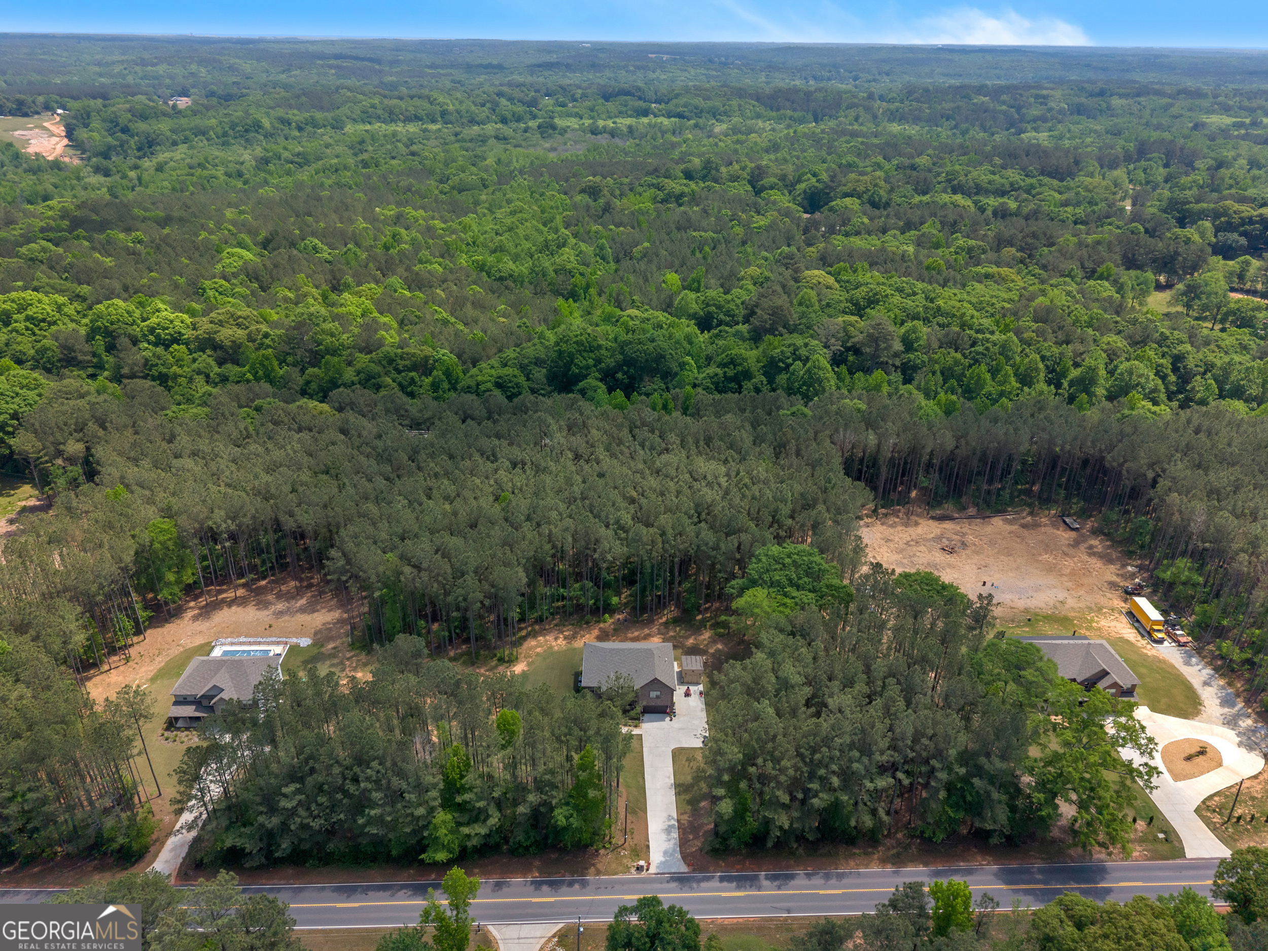11614 Alcovy Road Covington, GA 30014 - Photo 61 of 62 an aerial view of a house with a yard