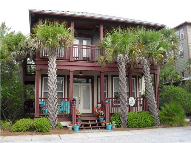 203 Seacrest Beach Boulevard East Seacrest, FL 32461 - Photo 1 of 24 a front view of a house with a tree